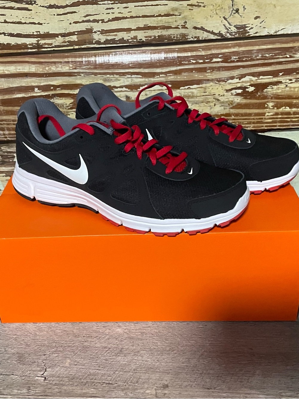 Nike Black Sneakers with Red Laces and White Swoosh - Picture 2 of 4